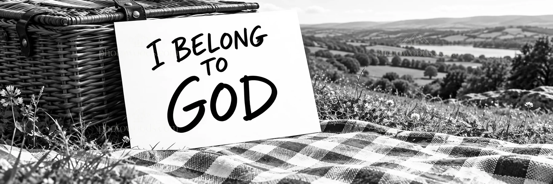 Jesus Christ in a field with a sign saying I belong to God - AI-generated stock image