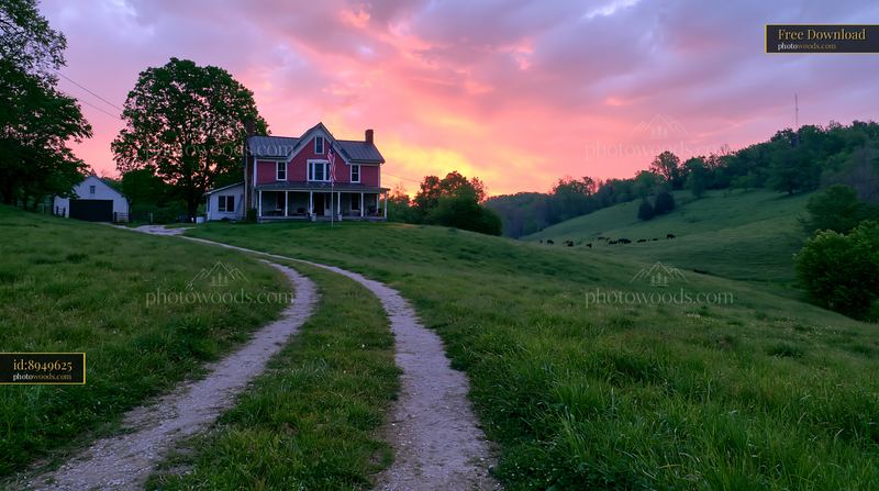 American flag on rural farmhouse at sunset