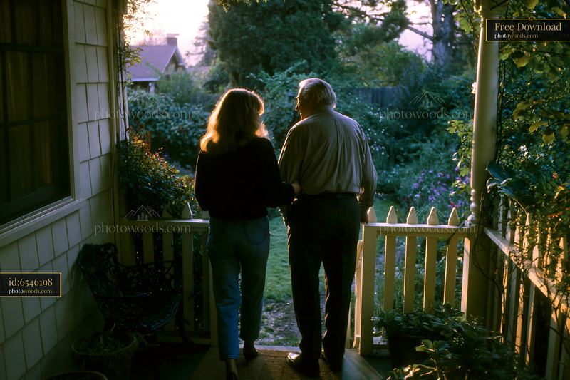 Support for a person with Parkinson's disease during an evening stroll