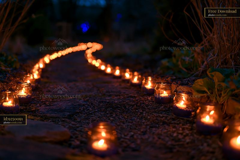 Military memorial garden at night with glowing candles
