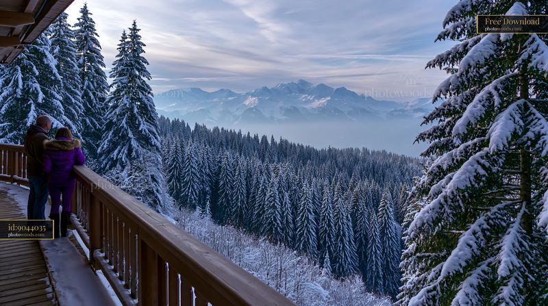 Snowy Mountain View From a Balcony in Winter