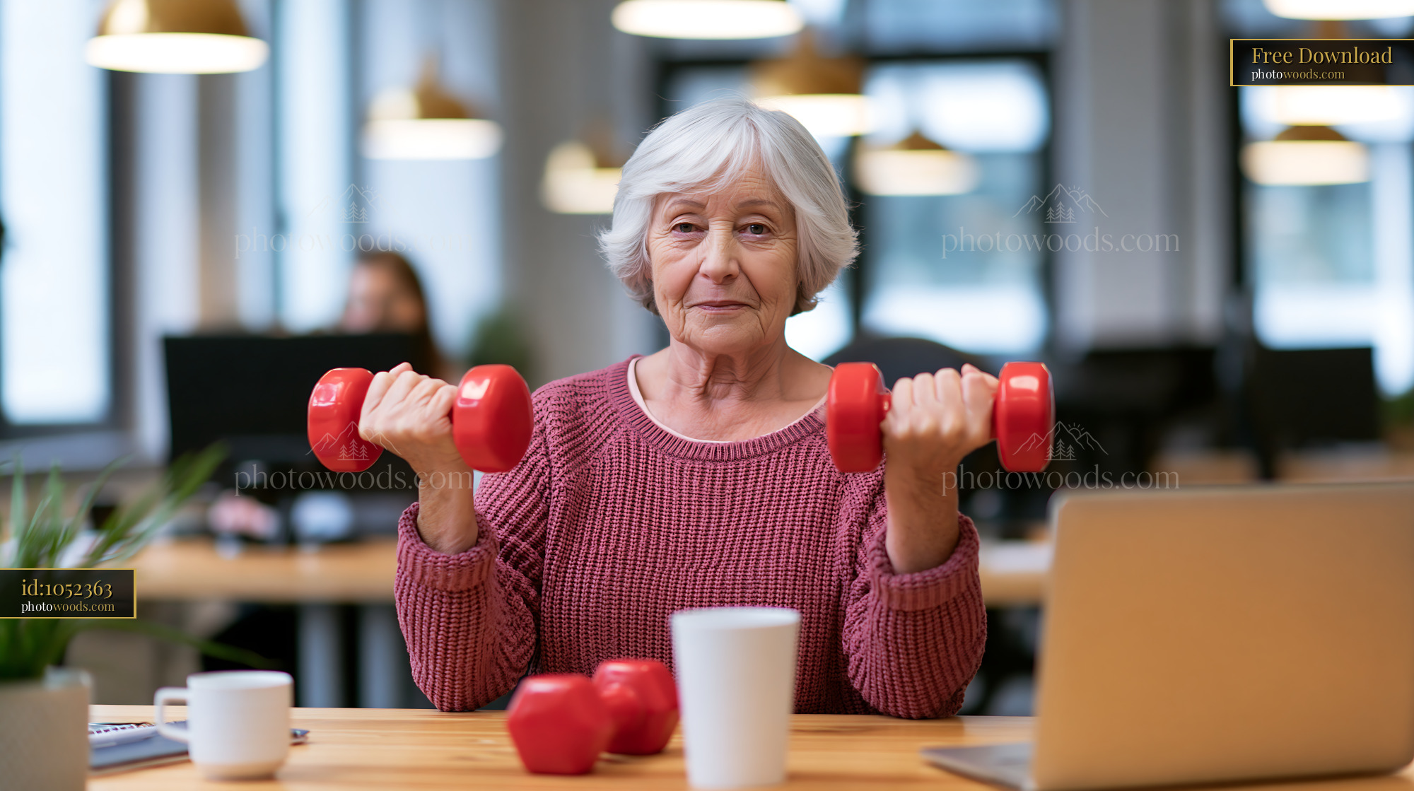 70 Year Old Woman Exercising With Weights Indoors