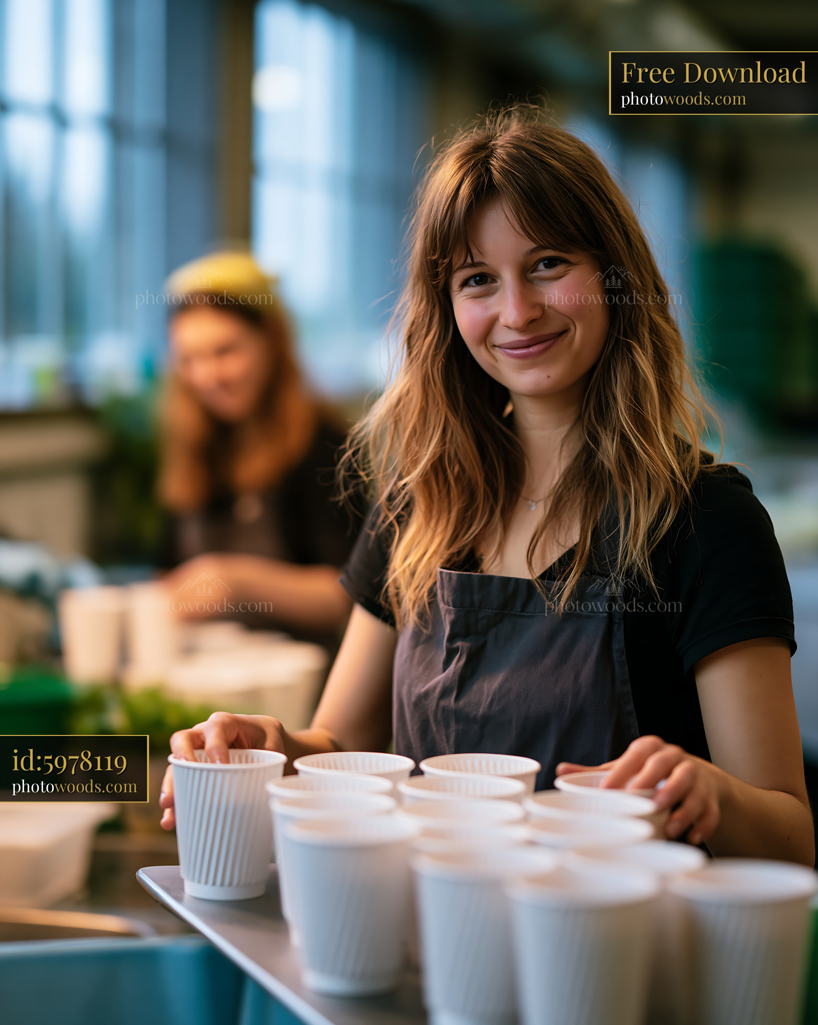 Sustainability Team Workshop With Volunteers Preparing Cups
