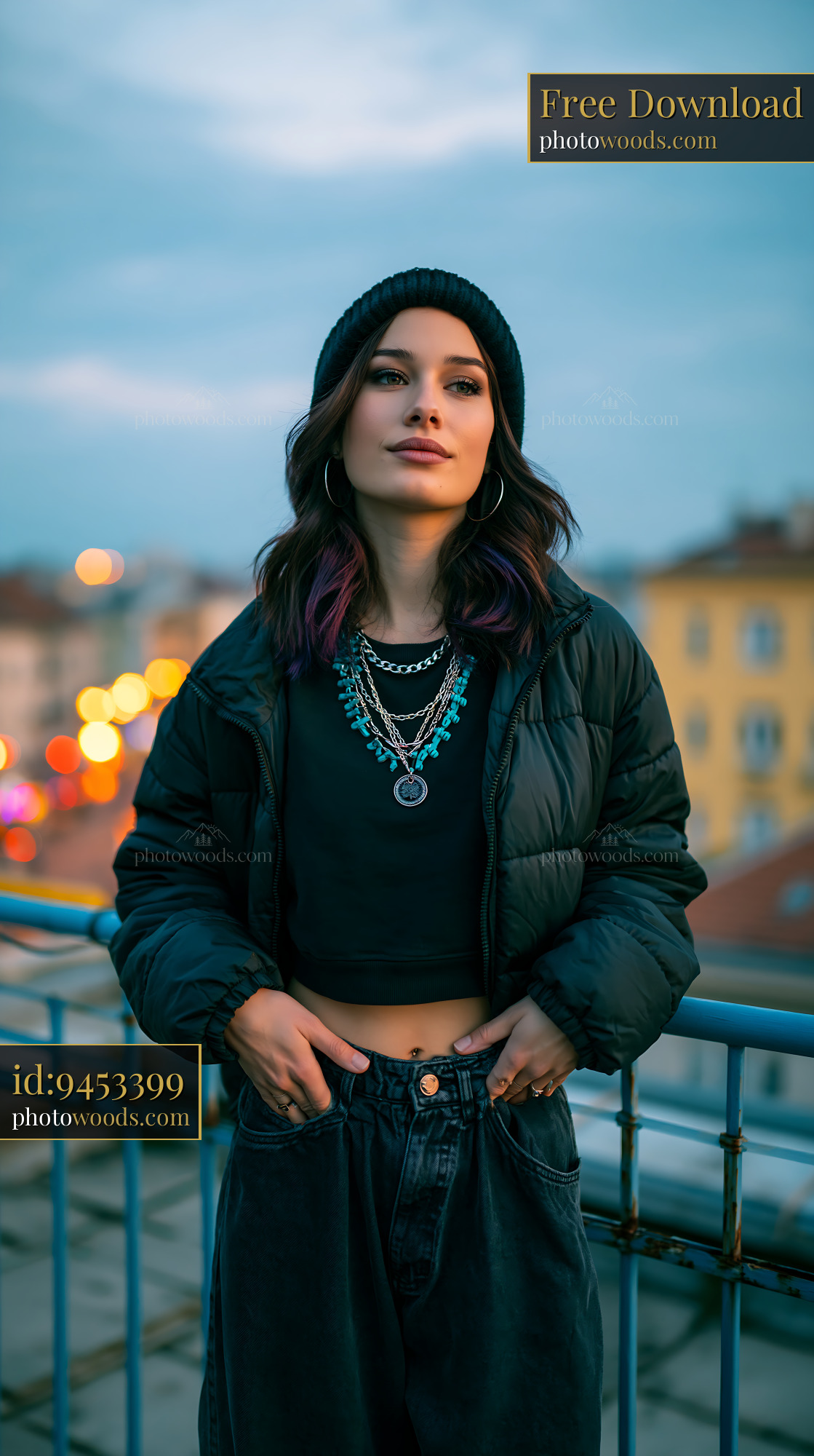 Woman in Cropped Puffer Jacket on Rooftop During Twilight