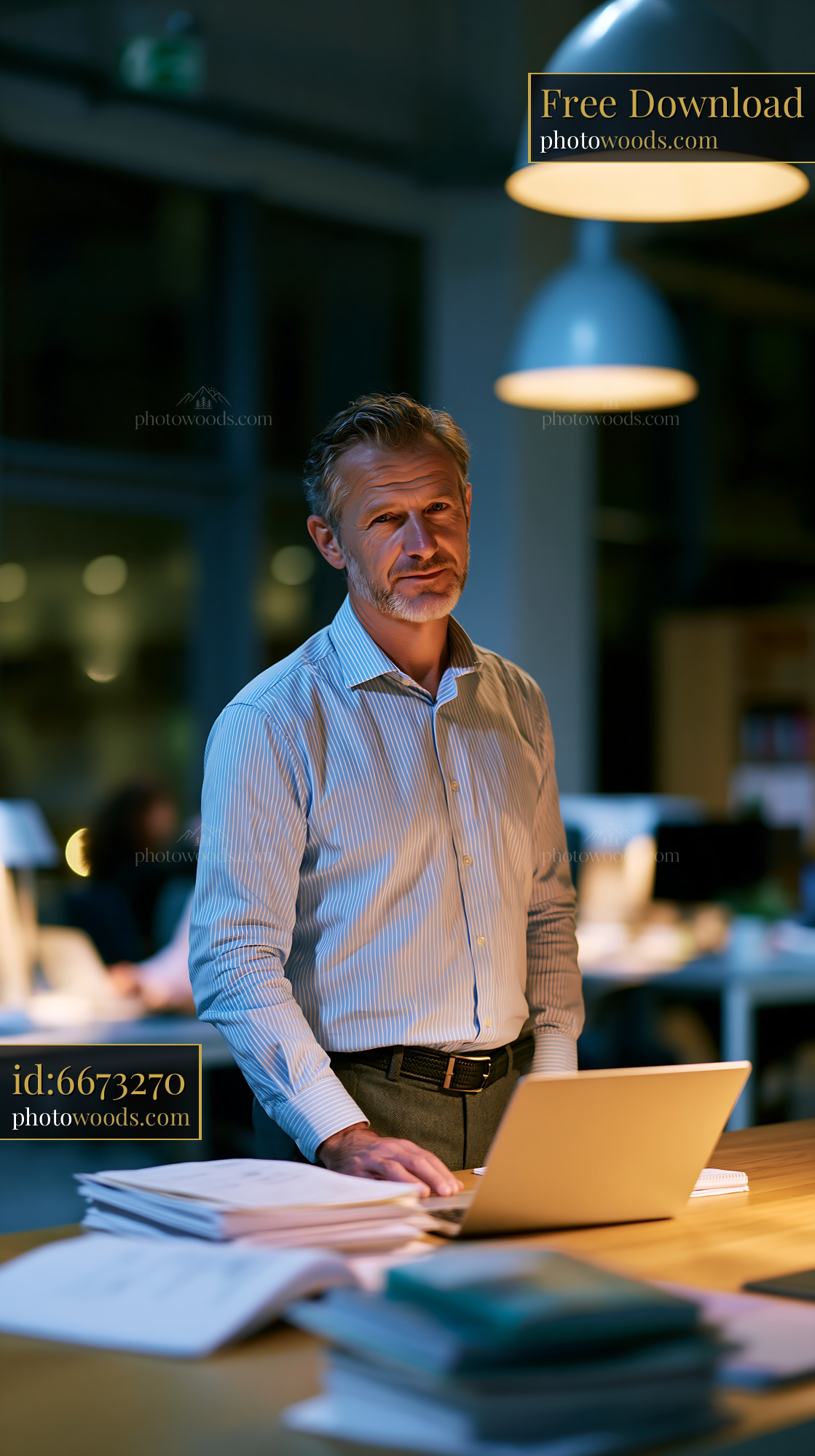 Compliance Officer Reviewing Files in Office at Night