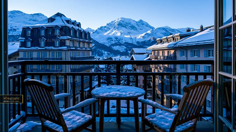 Beautiful Swiss mountain hotel balcony with snow-covered view