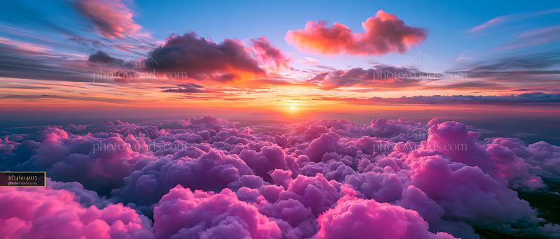 Colorful sunset over pink clouds in the sky
