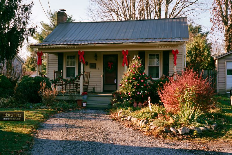 Cozy country cottage with Christmas decorations in winter