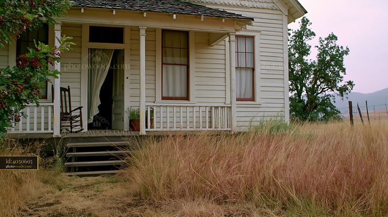 Country house with open front door and a front porch