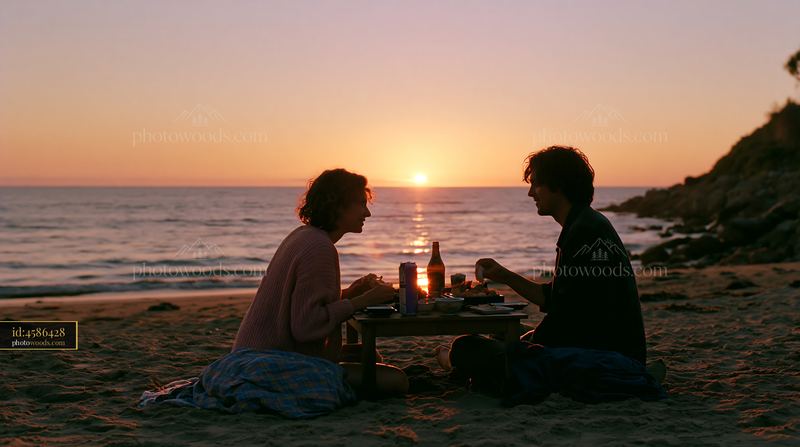 Couple enjoying sushi dinner on the beach at sunset