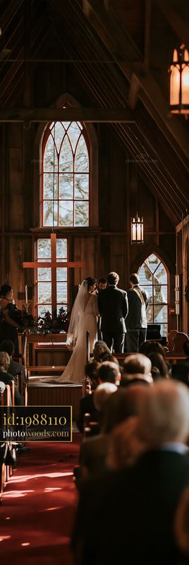 Small chapel marriage ceremony with couple and guests in attendance