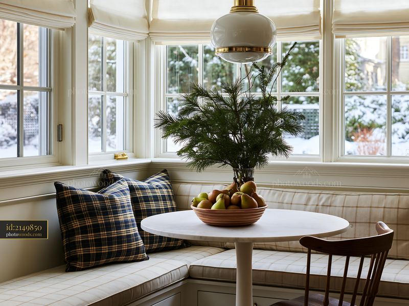 Elegant kitchen with festive decor and a cozy seating area