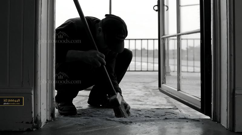 Lighthouse maintenance worker performing tasks indoors