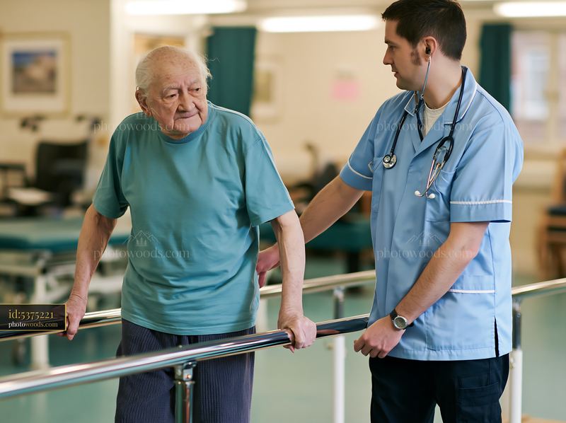 Medical professional assists elderly patient during gait assessment