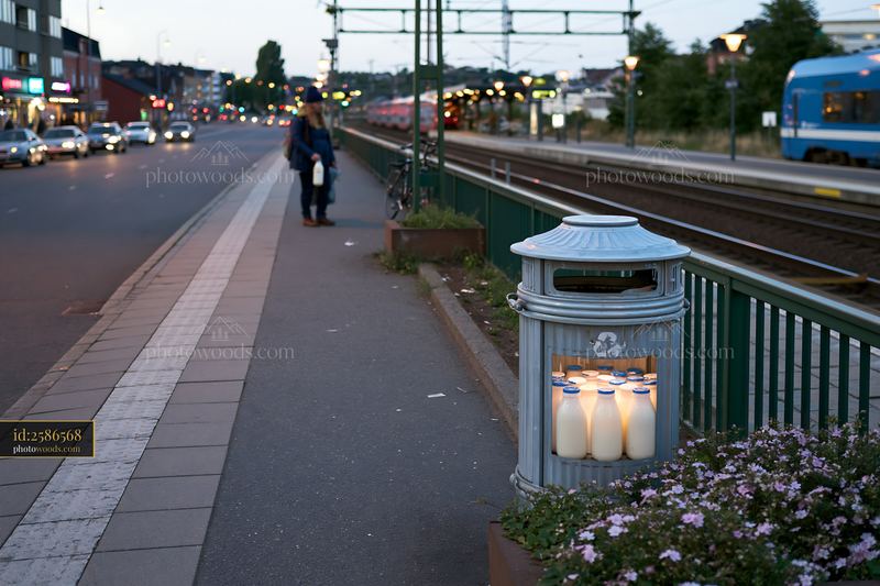 Milk bottle recycling bin on an urban street