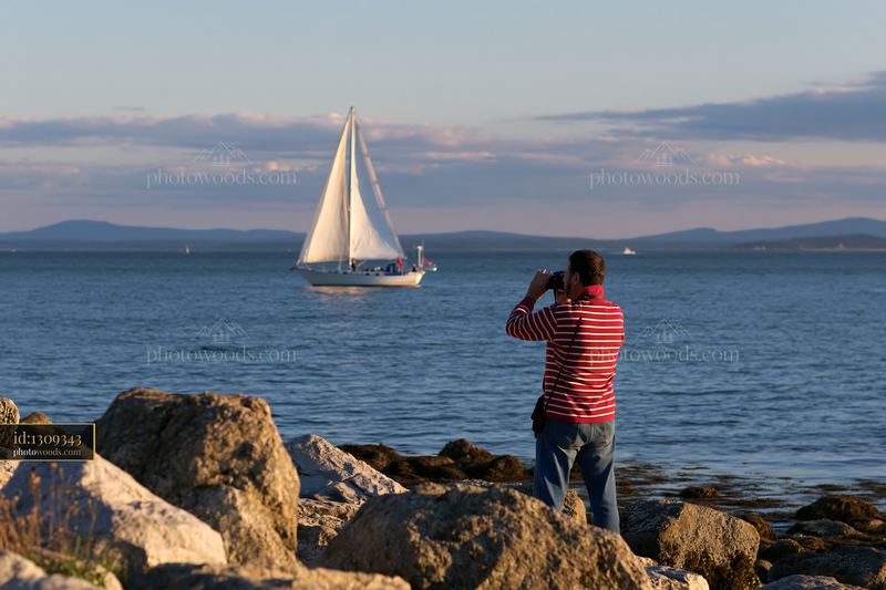 Photographer captures a sailboat sailing in the sea