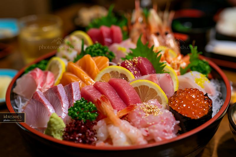 Sushi boat with assorted seafood on a wooden table