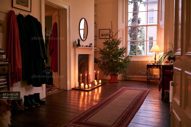 Cozy Christmas living room with glowing candles and a tree