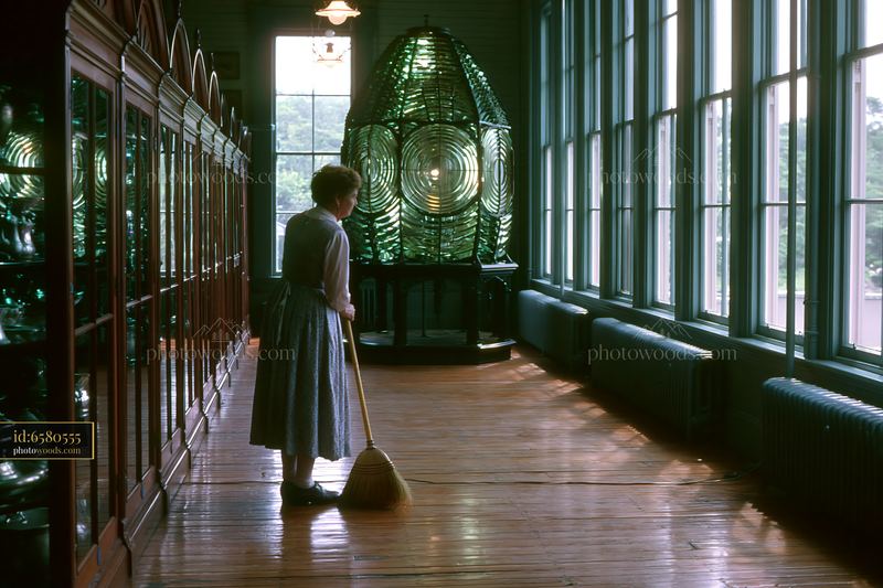 Lighthouse museum interior with woman cleaning display