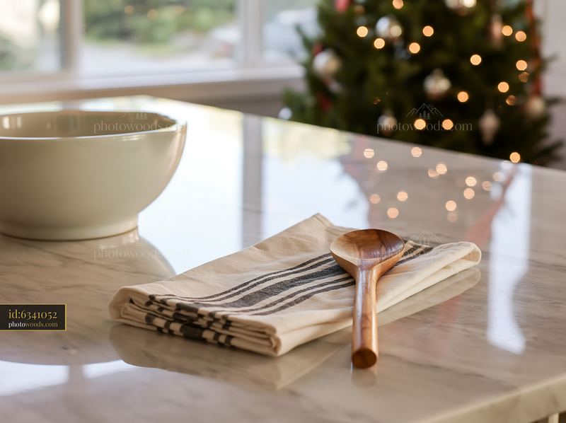Modern kitchen with Christmas tree reflection in the background