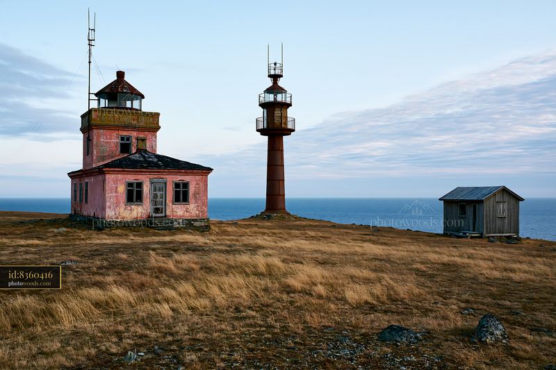 Abandoned lighthouse on a remote coast near the ocean