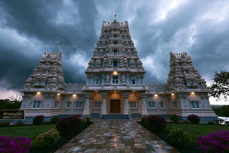 Architectural Temple Structure Against Dramatic Stormy Sky