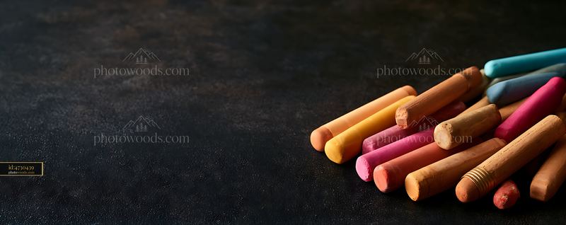 Chalk Pieces Arranged on a Chalkboard Surface