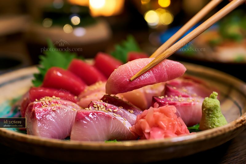 Sashimi platter with pickled ginger served at a restaurant
