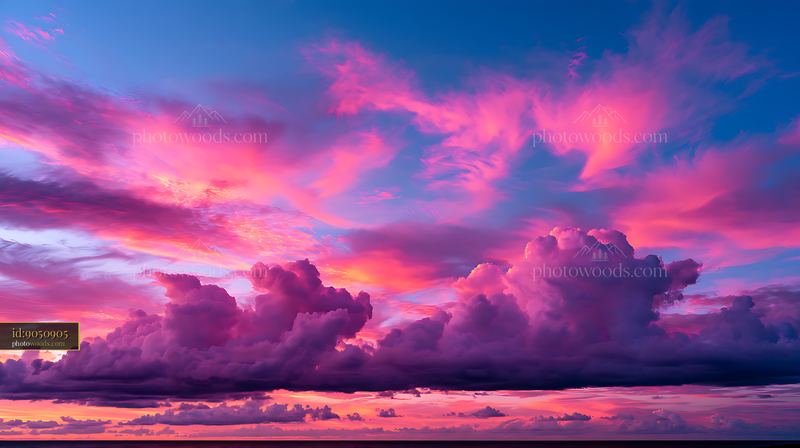 Cumulus Clouds at Sunset Over the Ocean