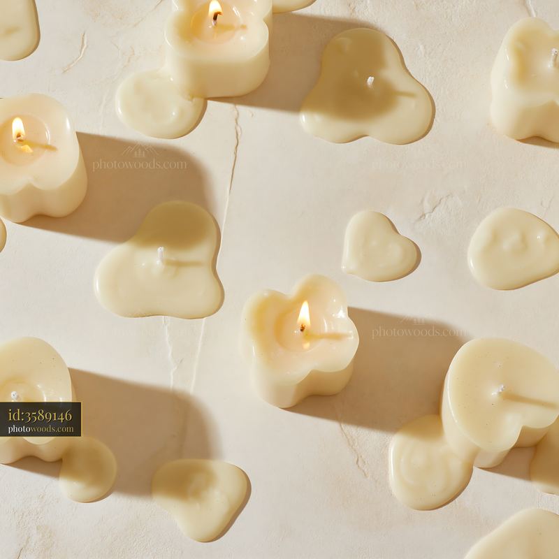 Vanilla candles on neutral background for decor and relaxation