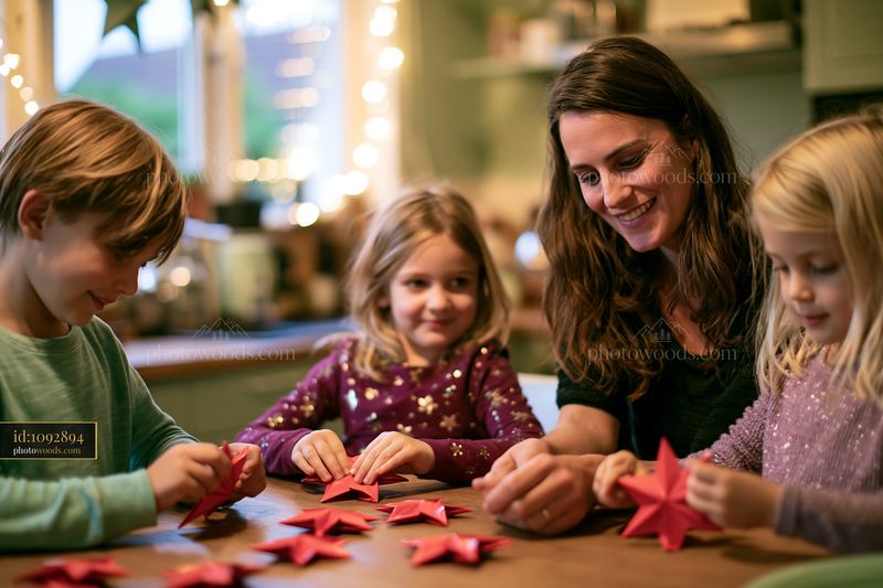 Mother and children making paper stars during a holiday craft