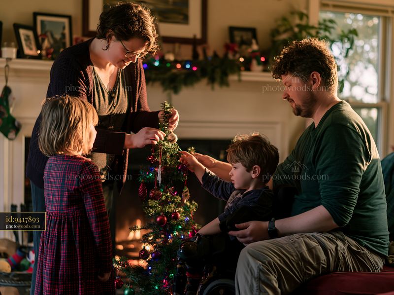 Parents and children decorating a Christmas tree together