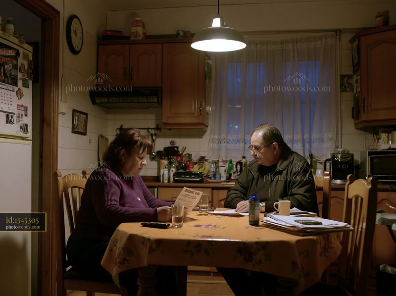 Parents looking at a missing child notice in a kitchen setting