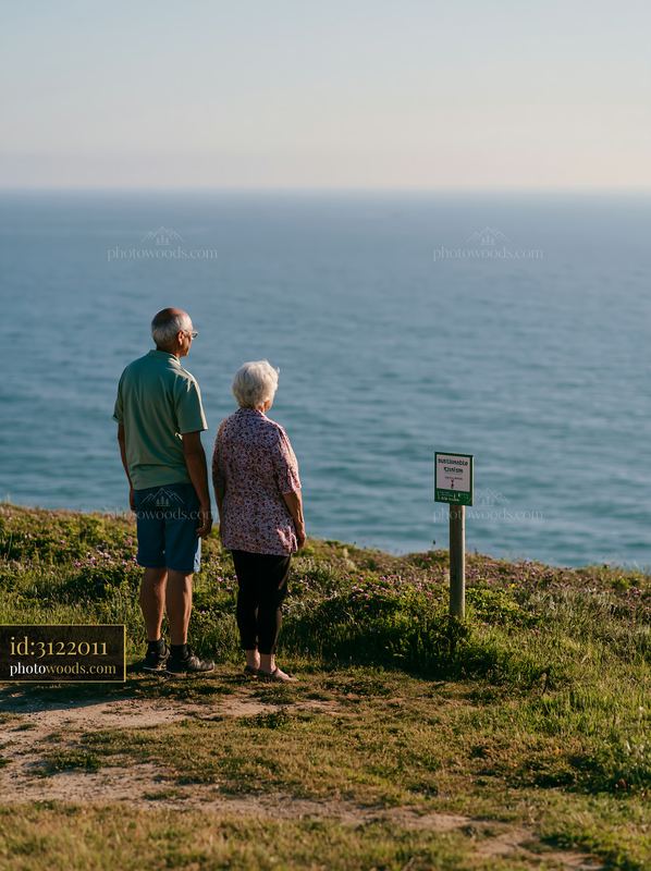 Coastline view with sustainable tourism sign in the background