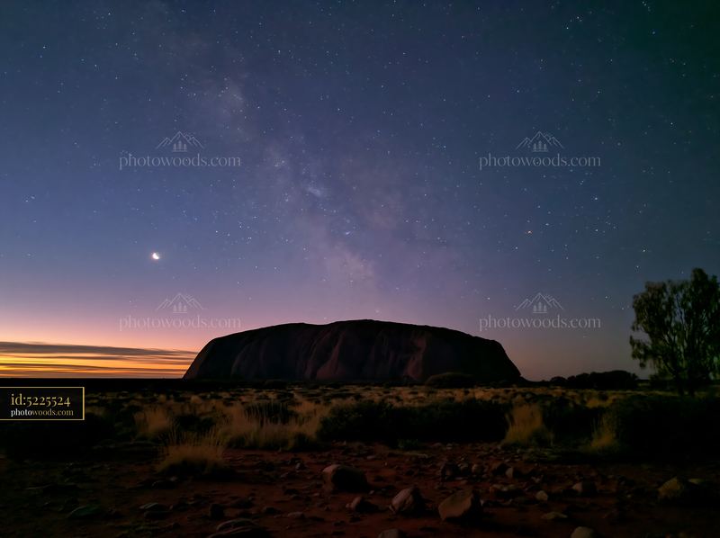 Uluru beneath a star-filled night sky