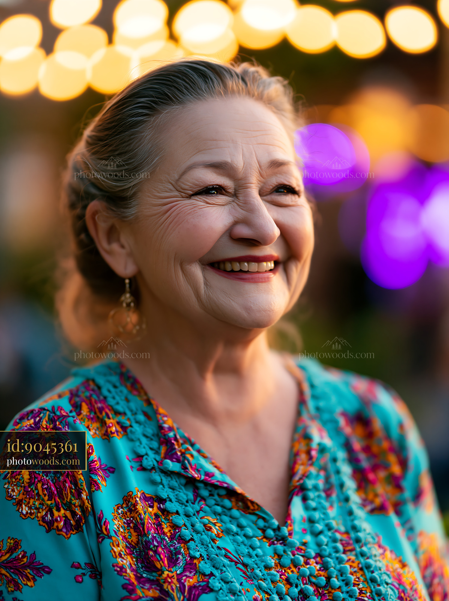 Older Woman Laughing in Colorful Attire at an Evening Gathering