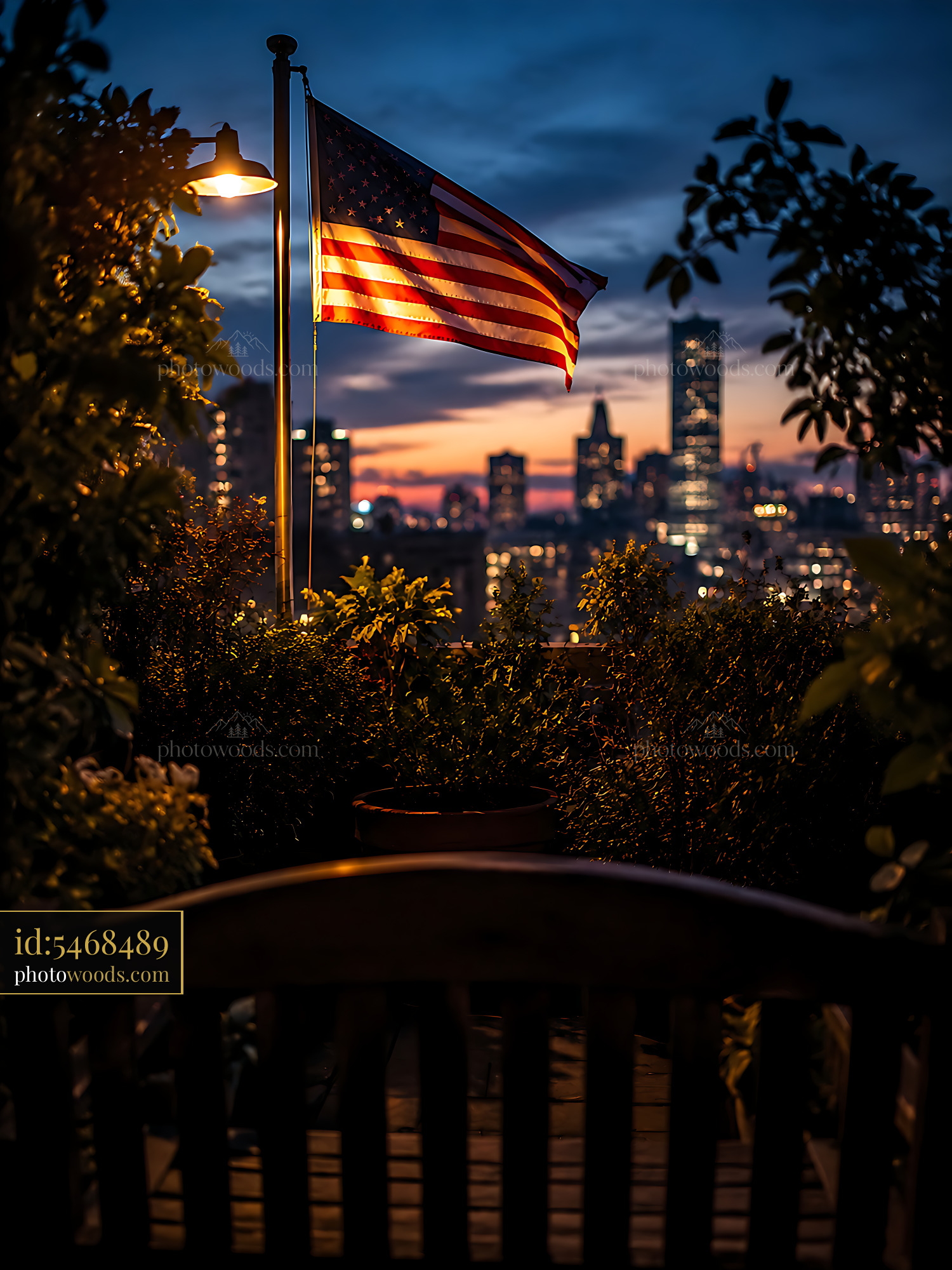 Flag Waving at Sunset With City Skyline in Background