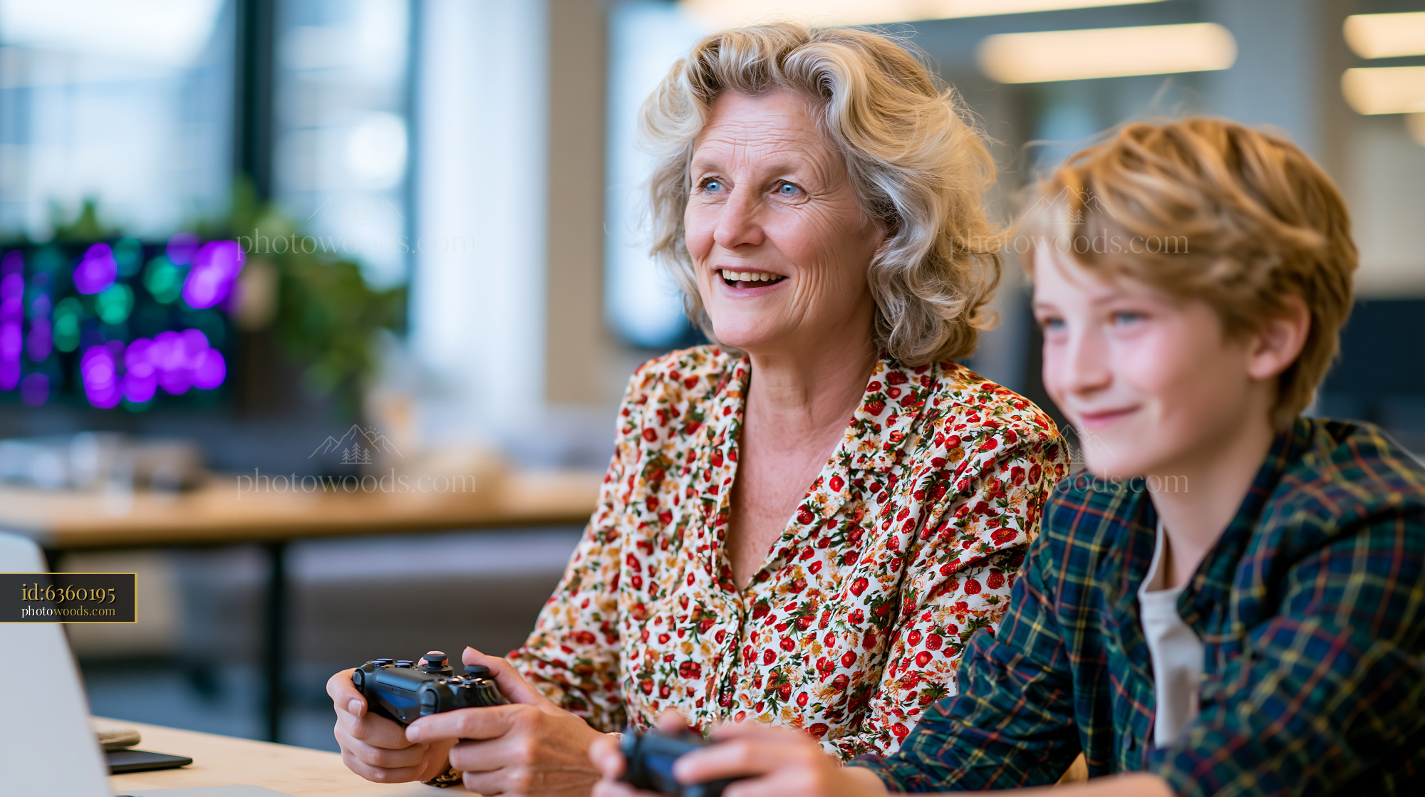 Older Woman and Her Grandson Gaming in a Modern Office Space