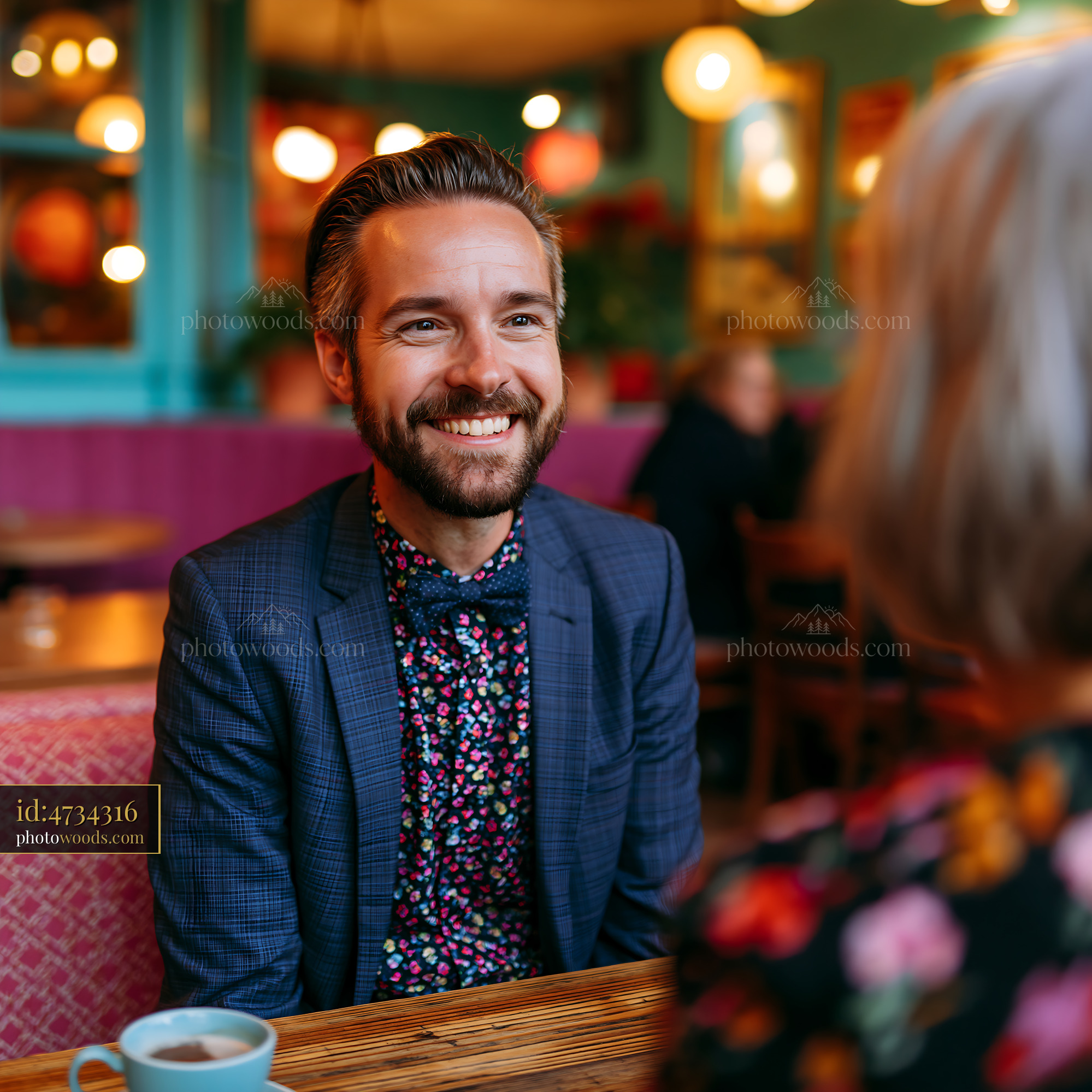 Laughing Accountant in a Cafe Enjoying Conversation