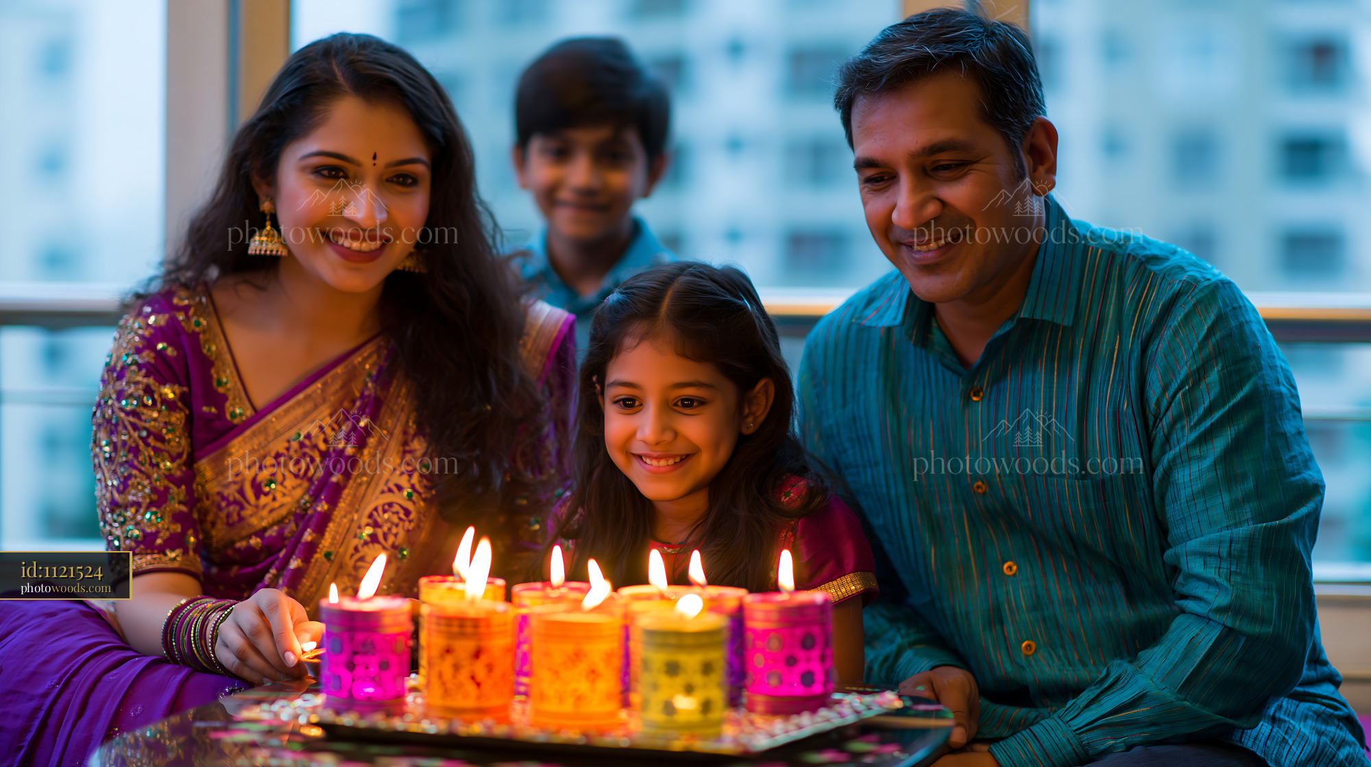 Family Celebrating Diwali With Candles Indoors in Evening Light