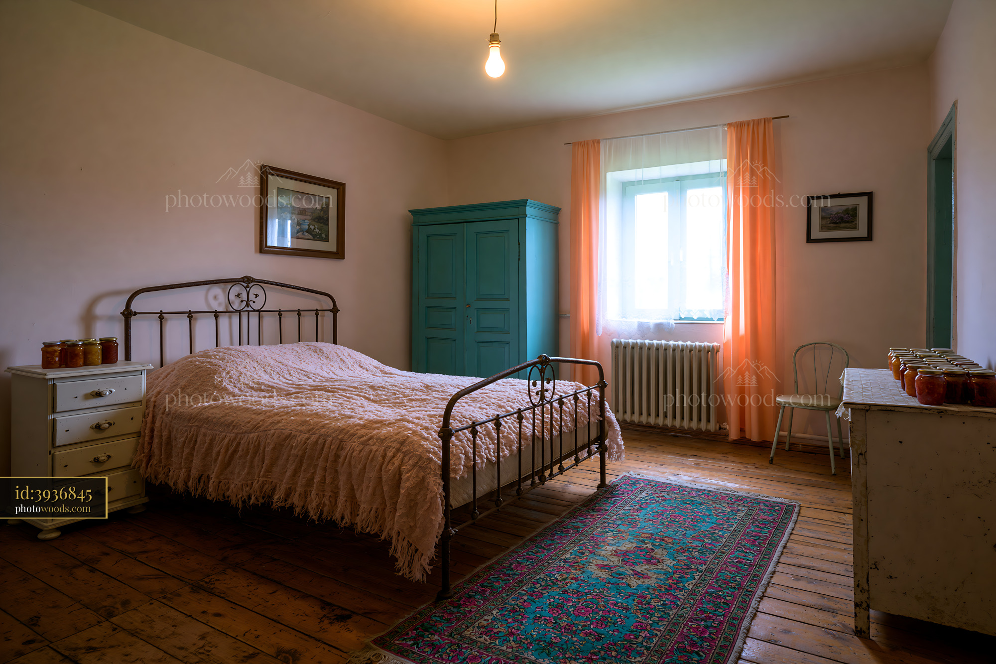Rural Bedroom With Iron Frame Bed and Natural Light