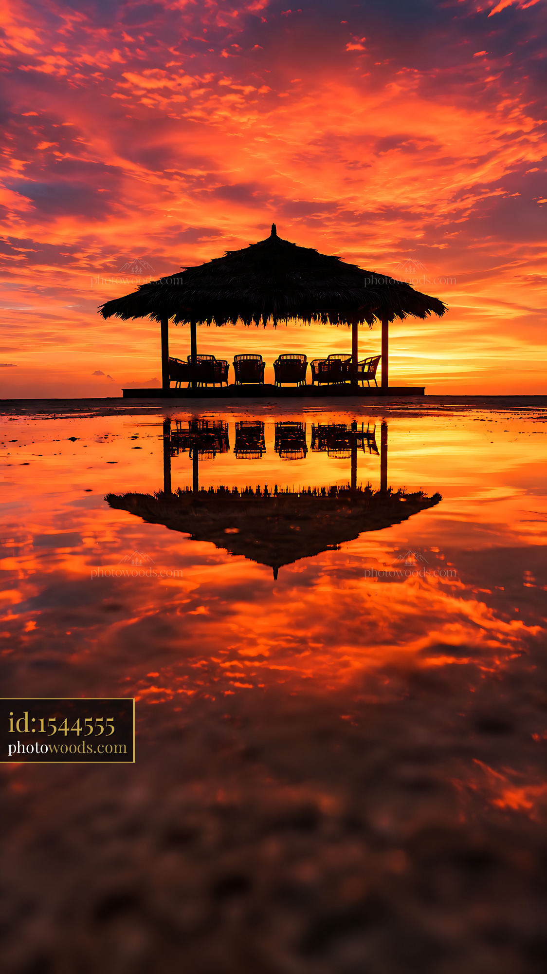 Beach Gazebo Silhouette Reflects Sunset Colors in the Sky
