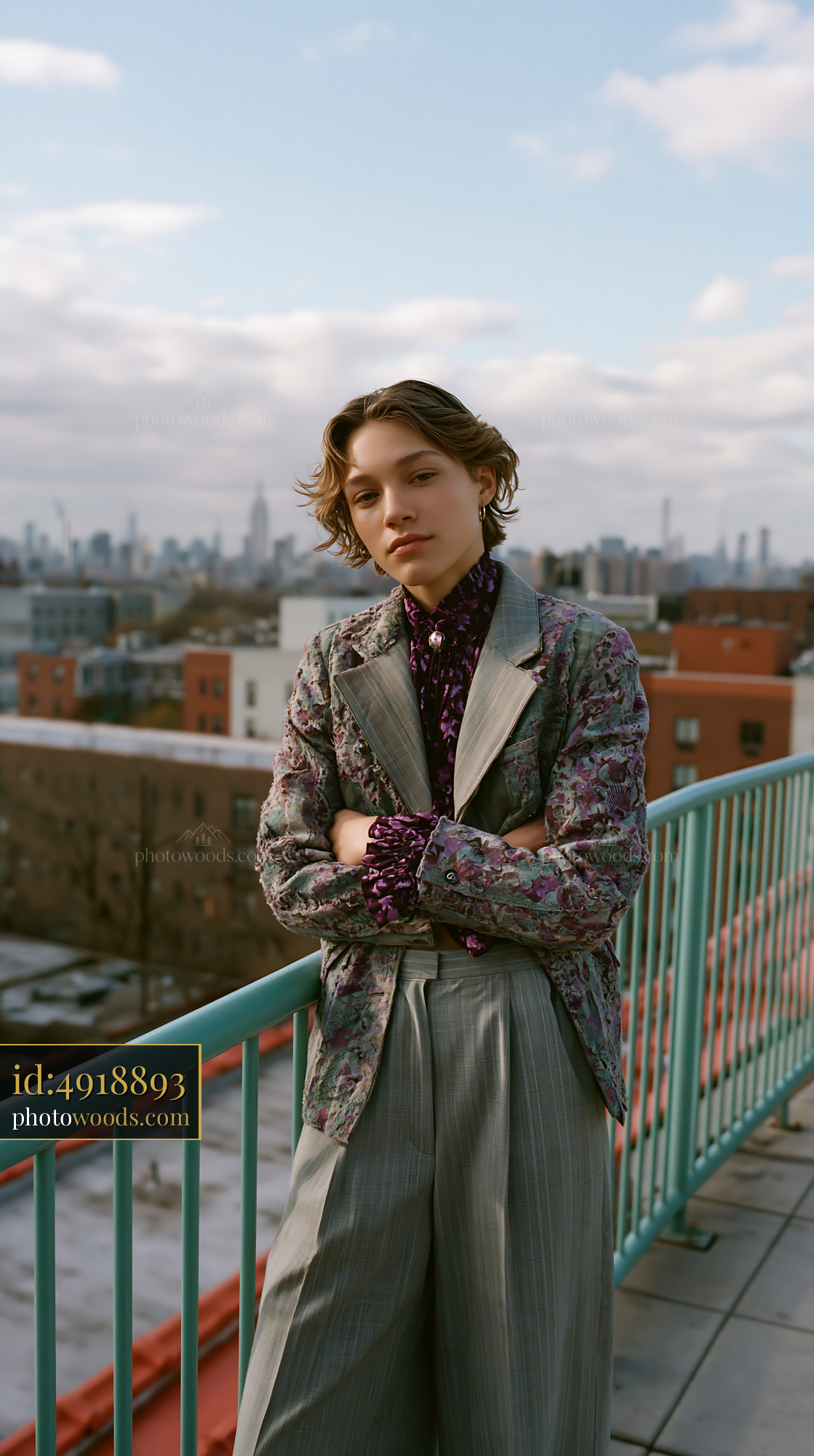 Androgynous Model Posing on Rooftop in Urban Setting
