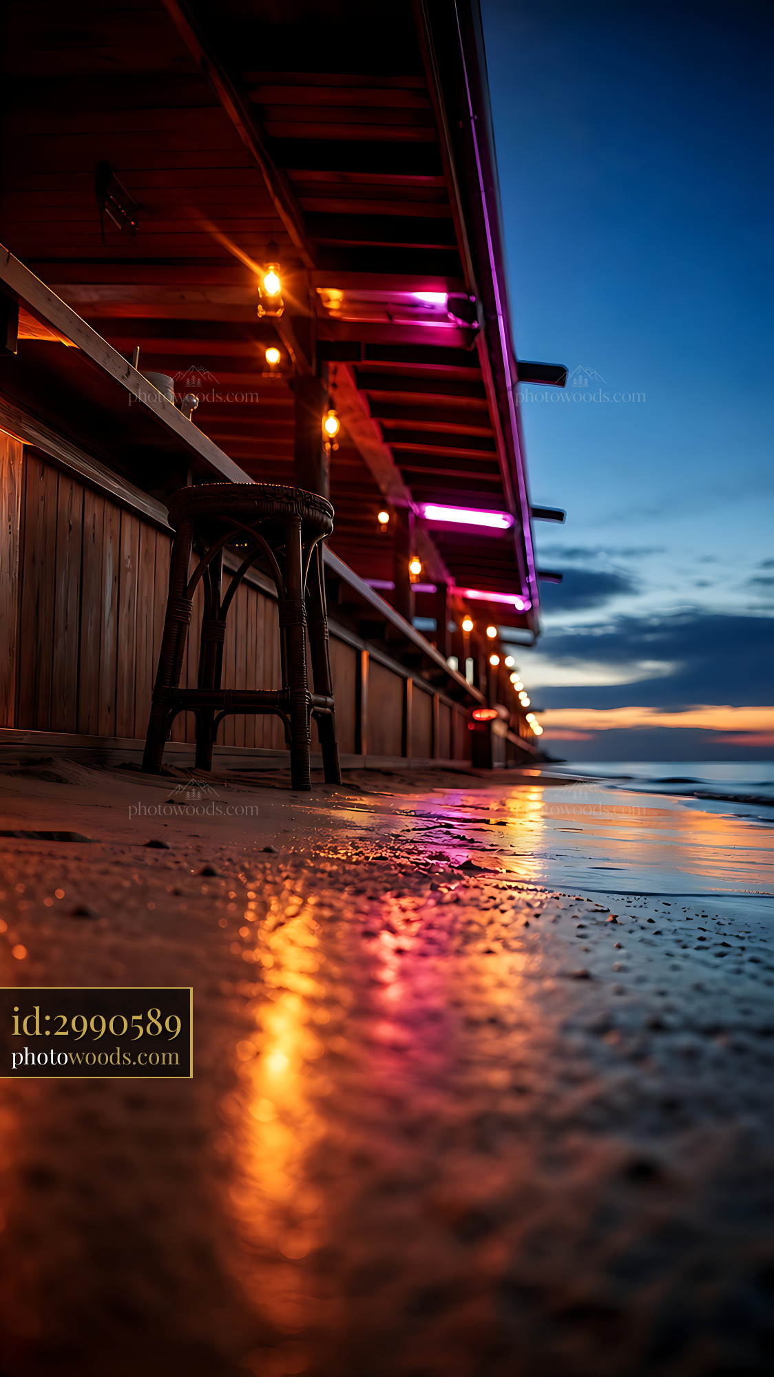 Beachside Bar at Sunset With Lights Reflecting on Wet Sand