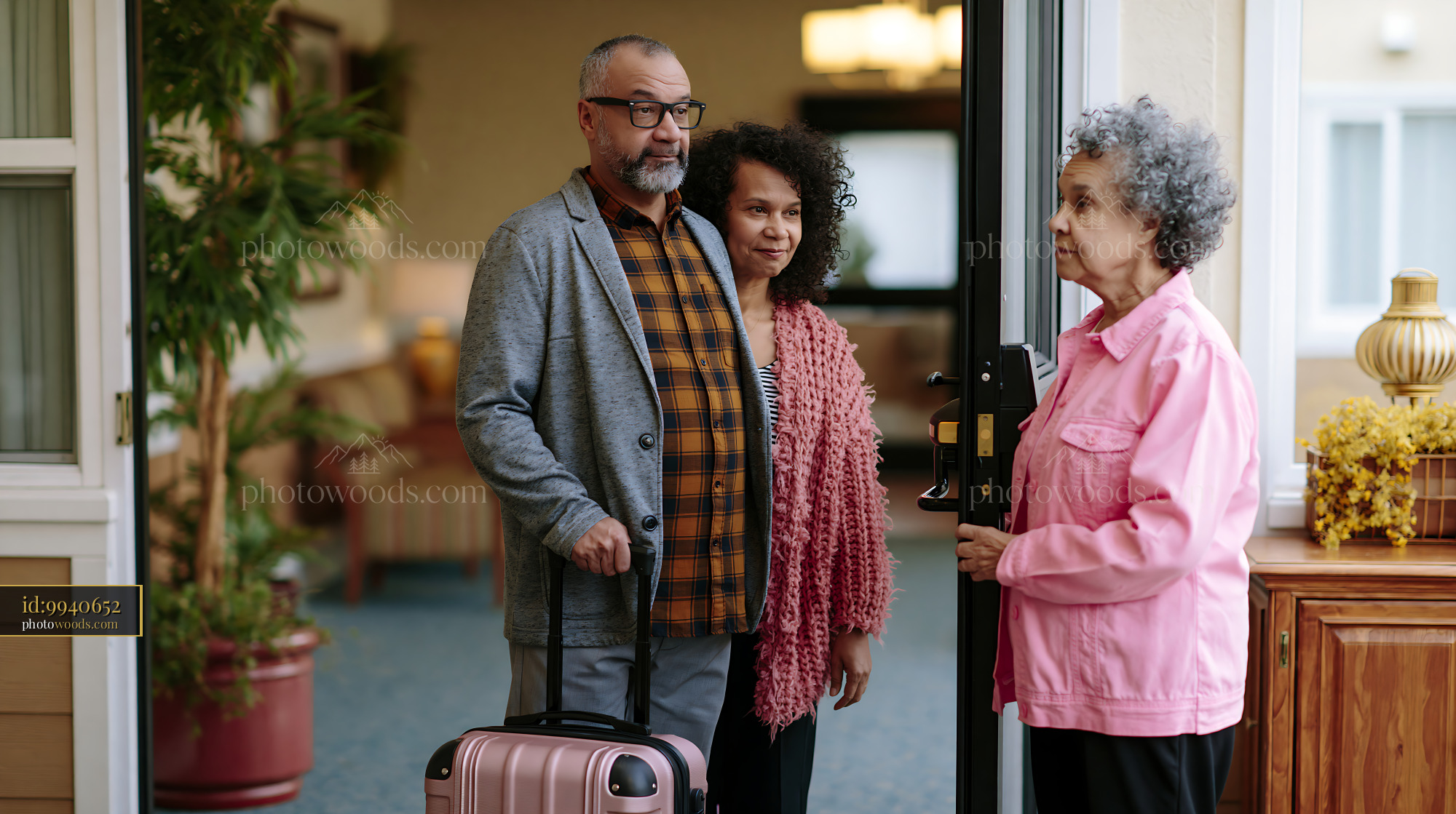 Adult Son Visits His Mother in Assisted Living With Suitcase
