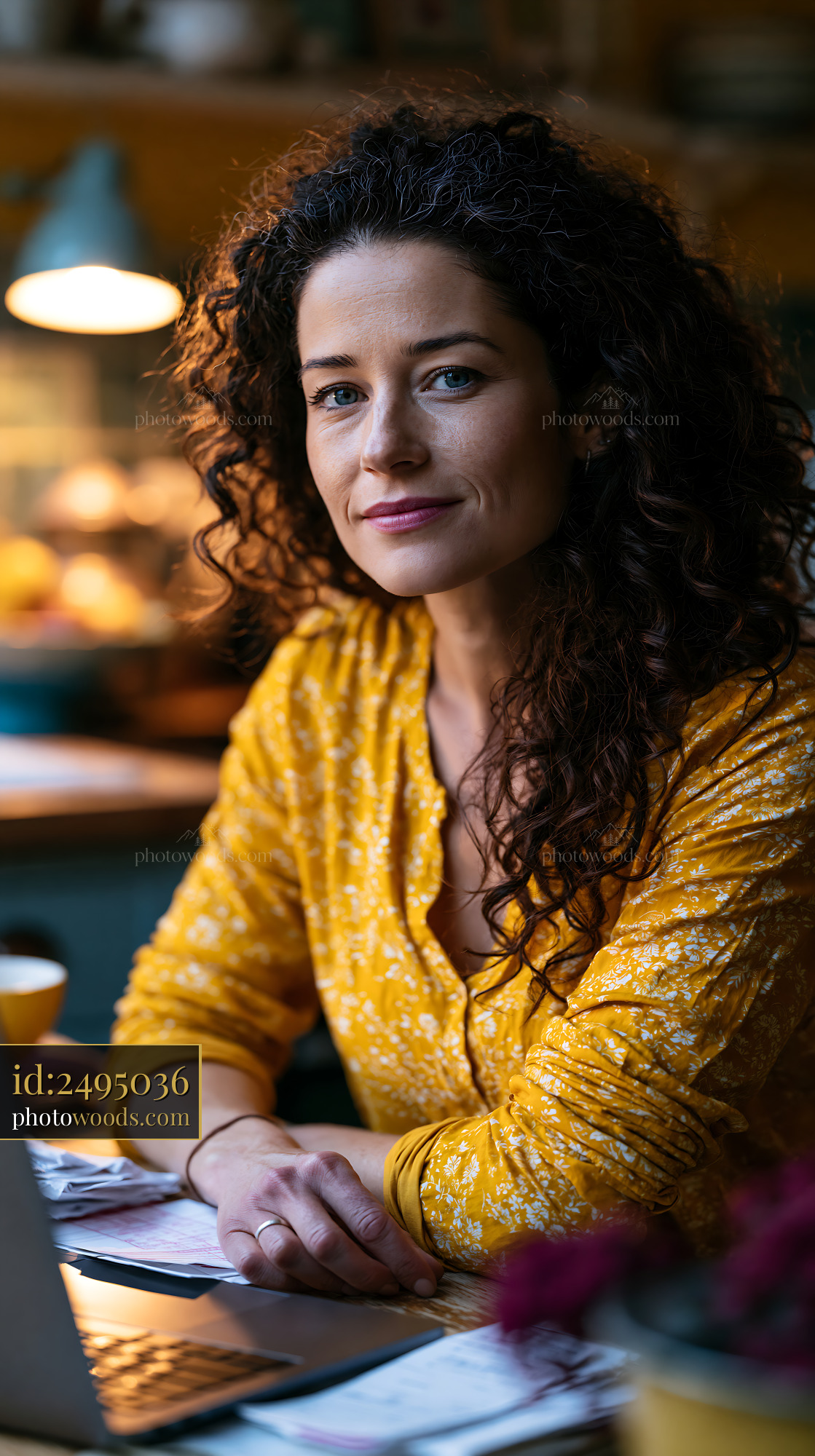 Freelancer Working at a Table With Invoices and Receipts