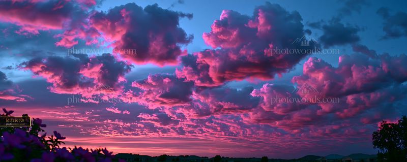 Colorful clouds during sunset over a landscape
