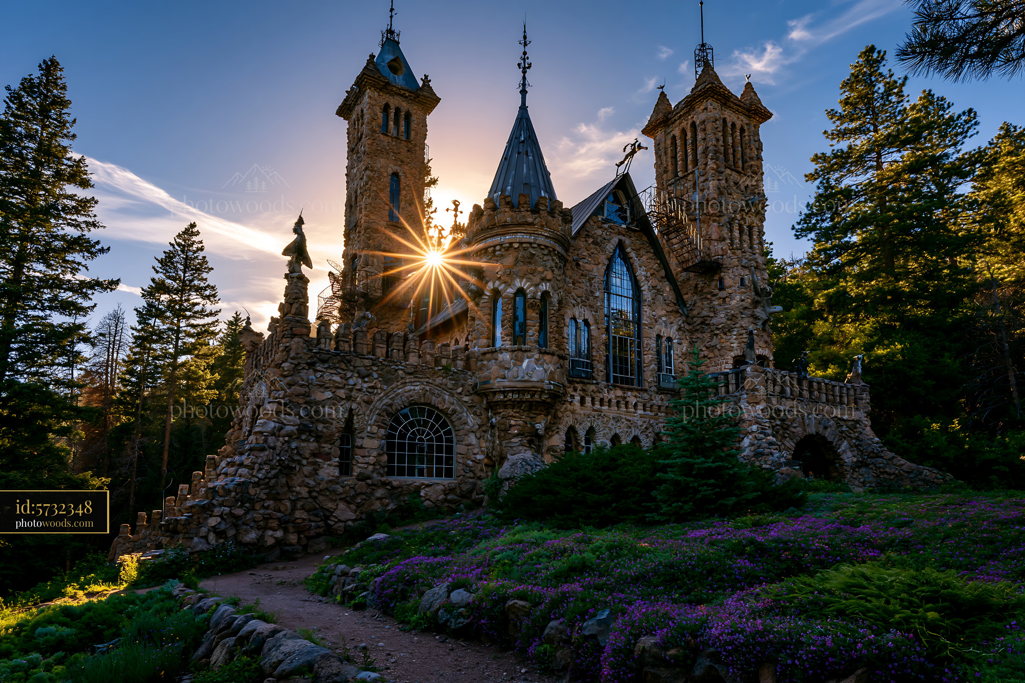 Bisho Castle During Sunset With Surrounding Trees and Flowers