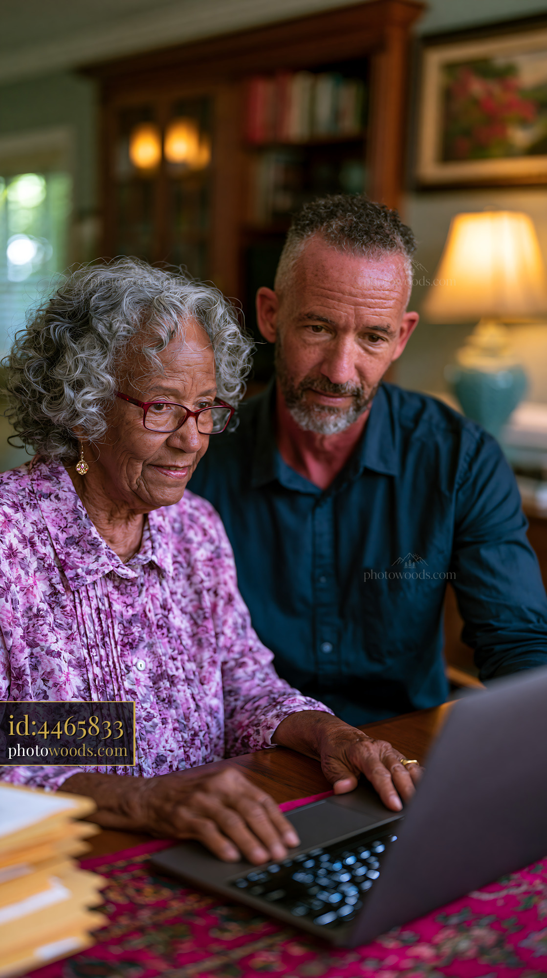 Adult Son Visiting Mother in Assisted Living Facility