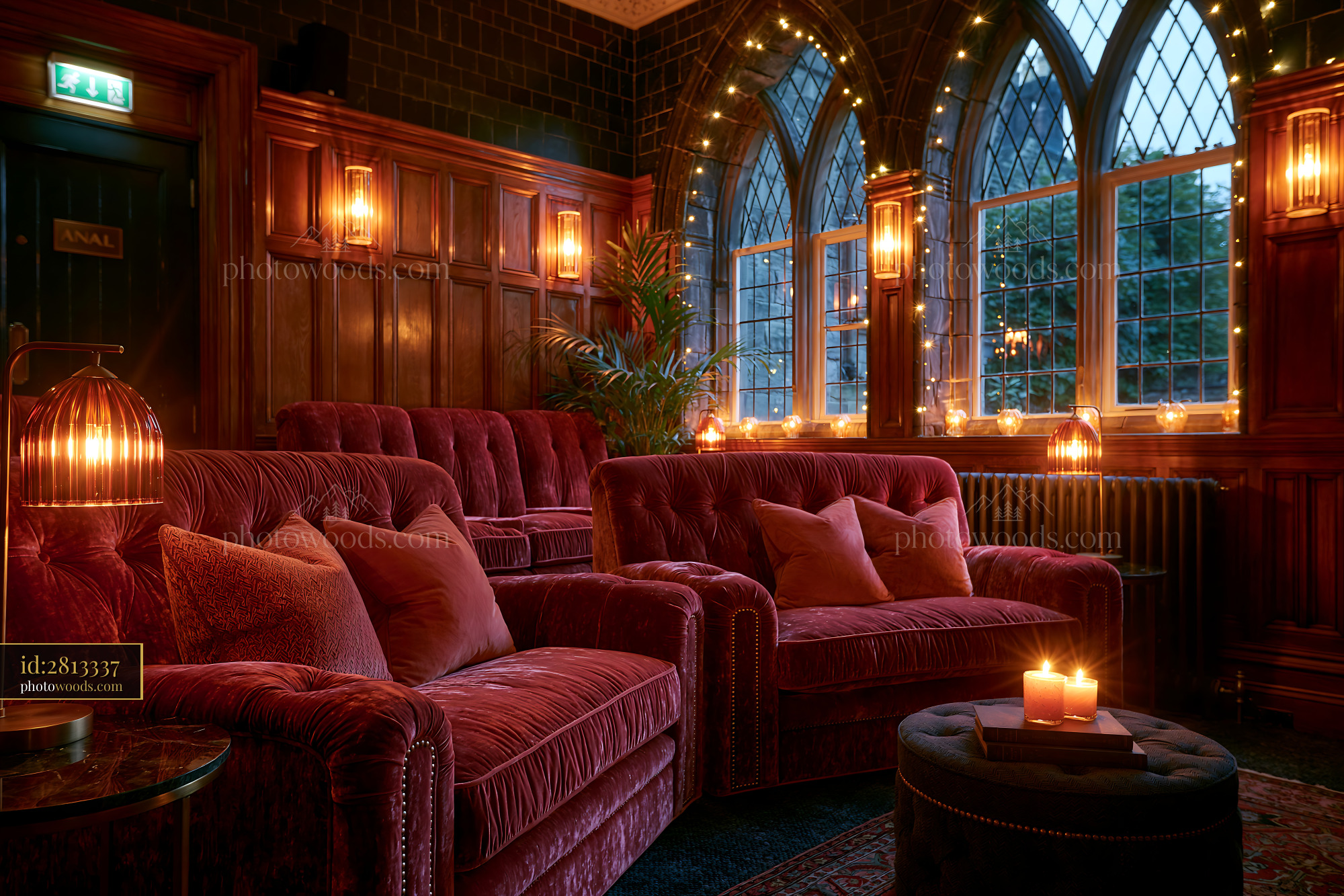 Home Cinema With Velvet Seating and Candlelight in a Cozy Setting